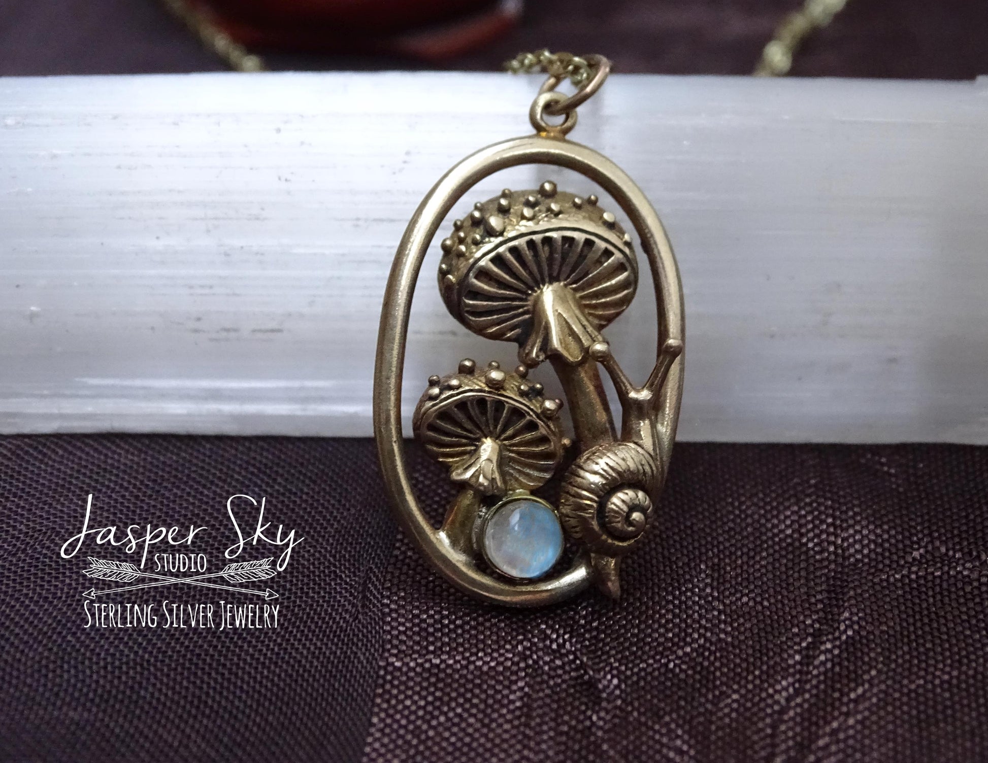 Gold Mushroom and snail pendant