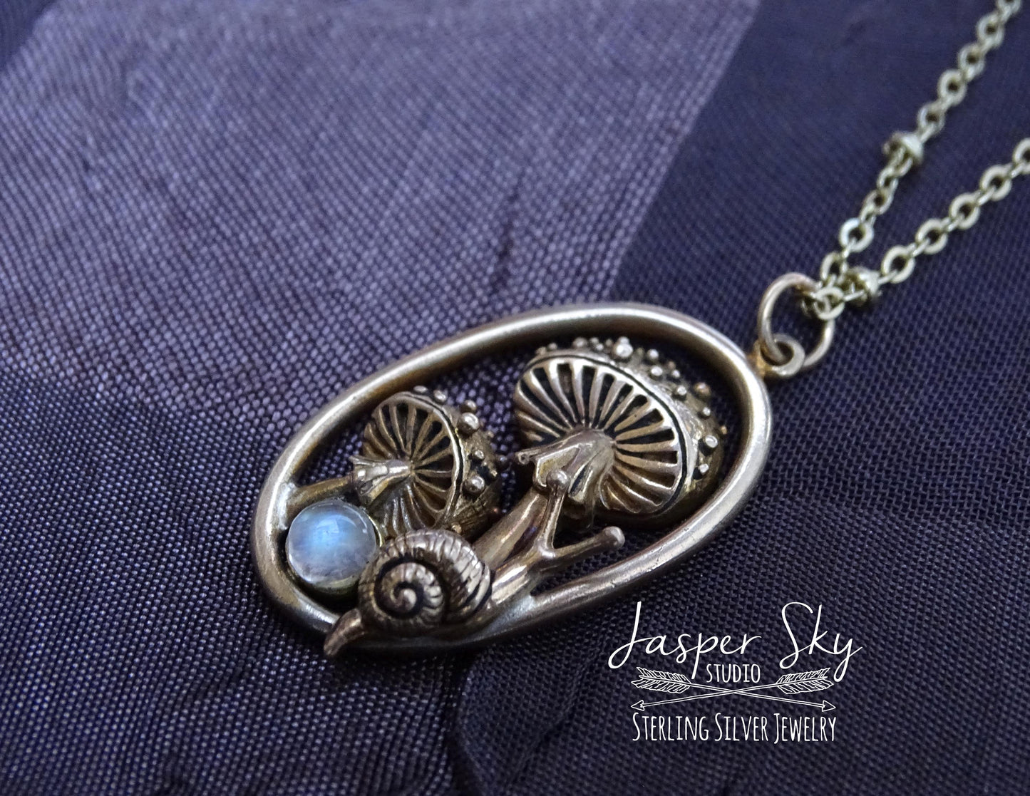 Gold Mushroom and snail pendant