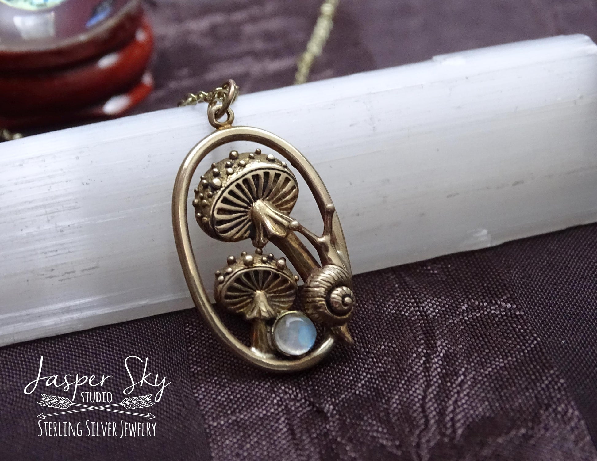 Gold Mushroom and snail pendant