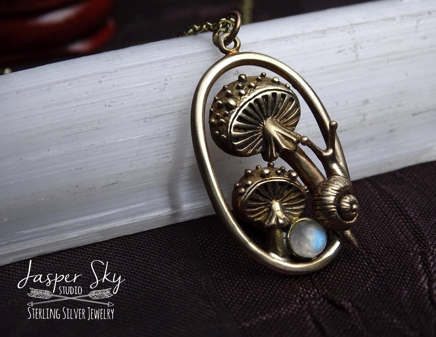 Gold Mushroom and snail pendant