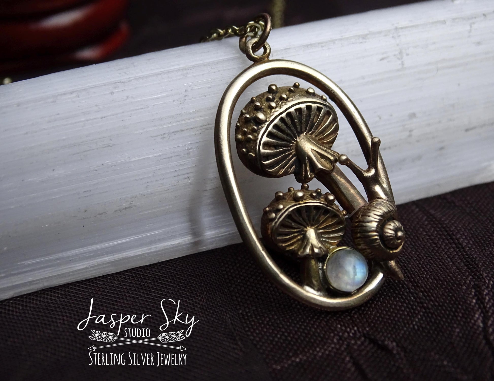 Gold Mushroom and snail pendant