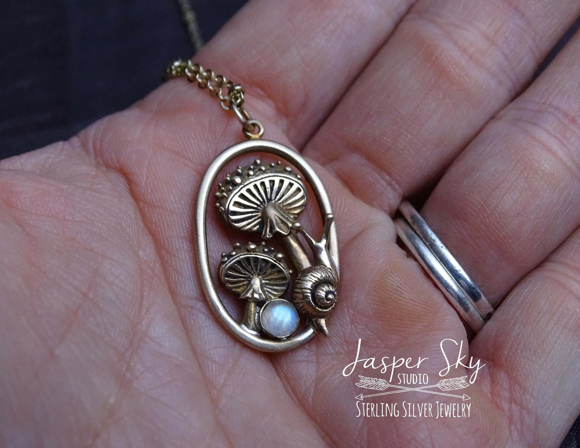 Gold Mushroom and snail pendant