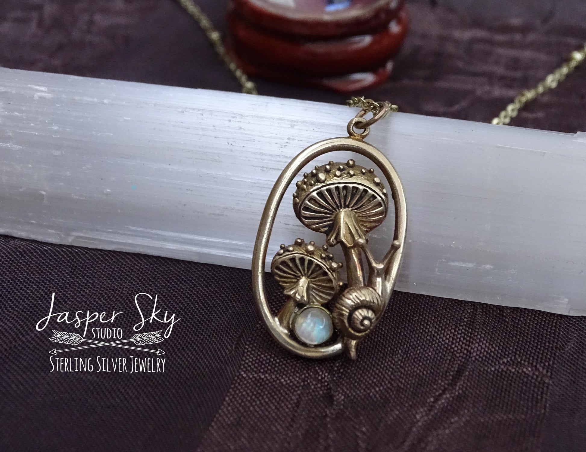 Gold Mushroom and snail pendant